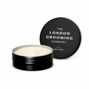 London Grooming Clay – opakowanie z tekturą produktu w tle